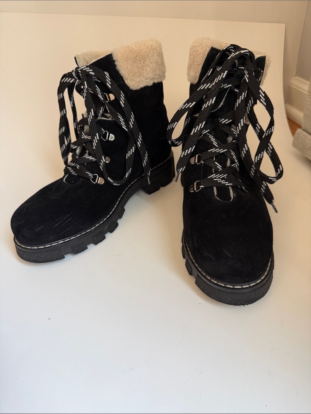 La CANADIENNE Black Lace-Up Suede Boots with Cream Shearling Cuff and interior
